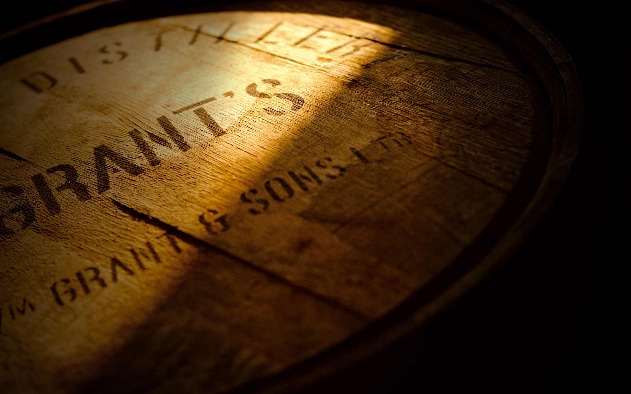 Top of whisky barrel with half shaded in shadow